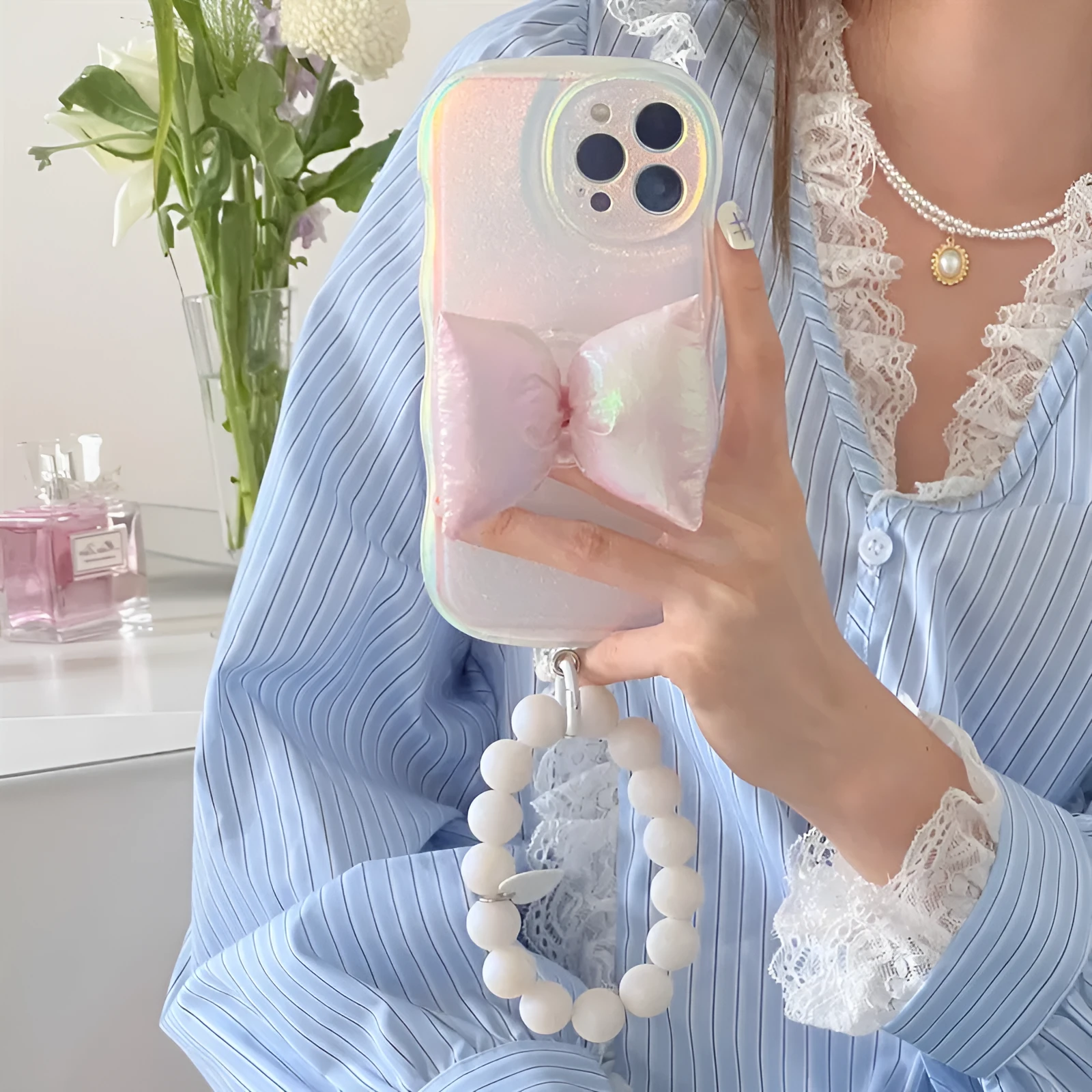 Soft silicone iPhone case with laser sparkle powder and bowknot design in pink