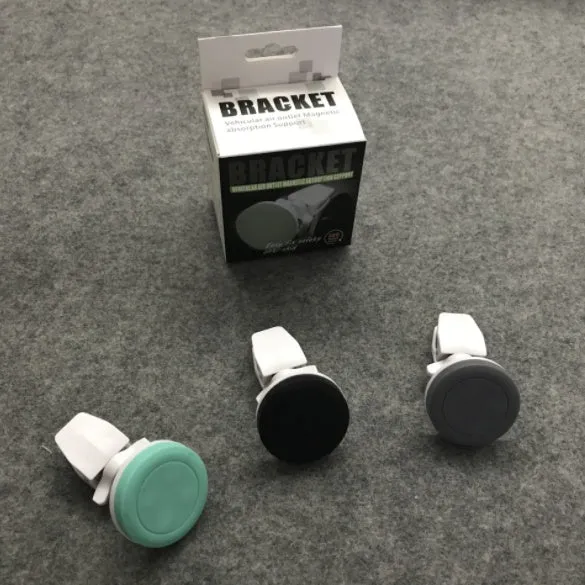 Cross border patented vehicle mounted magnetic handset holder in black, blue, and grey colours for car phone use.