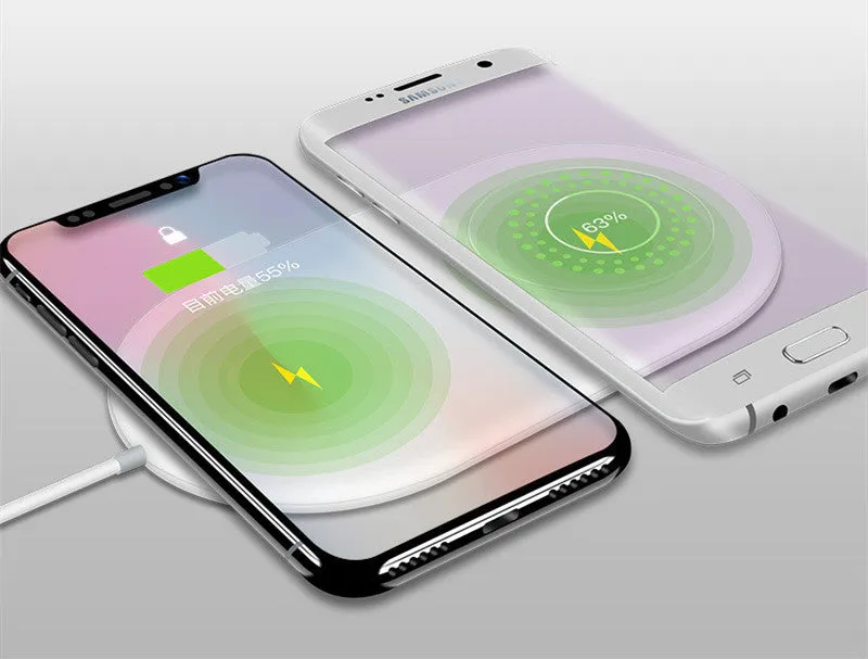 White dual wireless charging pad for two mobile phones on simple design
