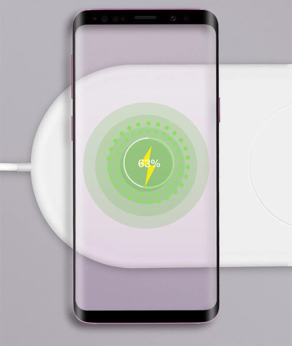 White dual wireless charging pad for two mobile phones on simple design