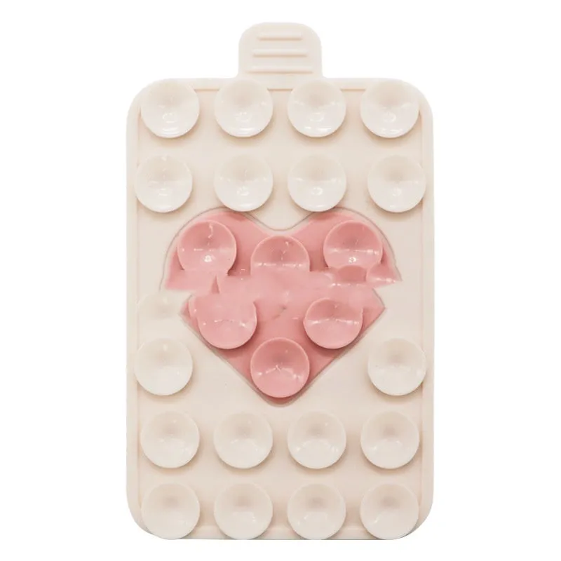 Double sided silicone suction cup phone case holder in gray white, showing hot pressed construction for universal fit on smooth surfaces