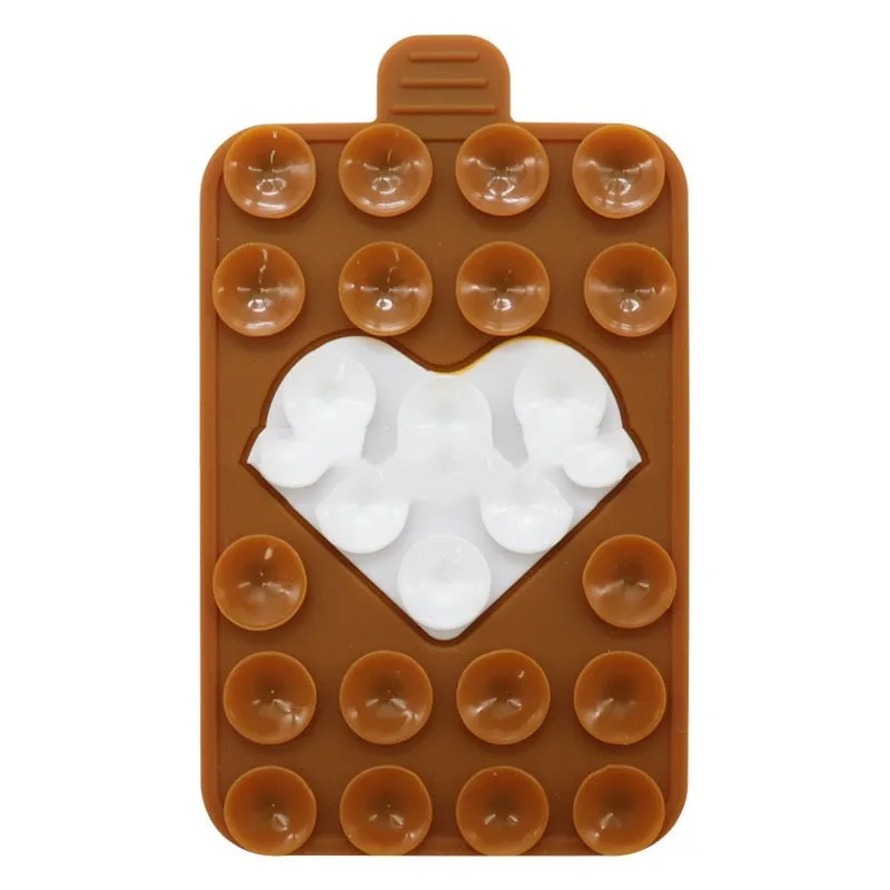 Double sided silicone suction cup phone case holder in gray white, showing hot pressed construction for universal fit on smooth surfaces