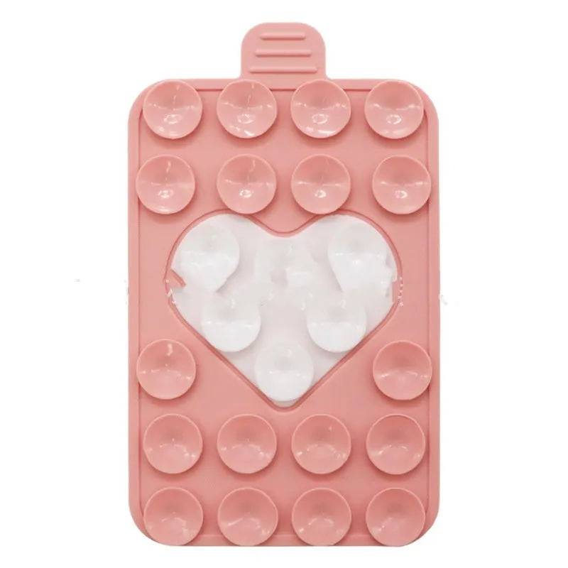 Double sided silicone suction cup phone case holder in gray white, showing hot pressed construction for universal fit on smooth surfaces