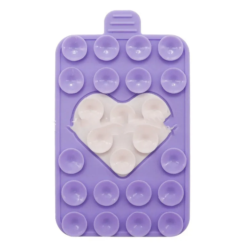 Double sided silicone suction cup phone case holder in gray white, showing hot pressed construction for universal fit on smooth surfaces