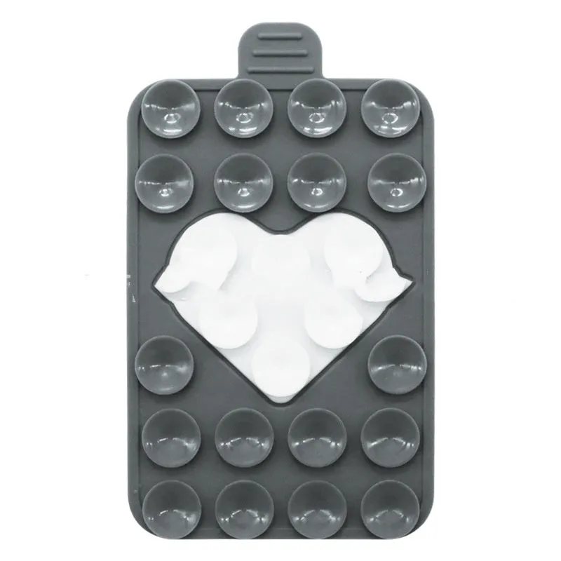 Double sided silicone suction cup phone case holder in gray white, showing hot pressed construction for universal fit on smooth surfaces