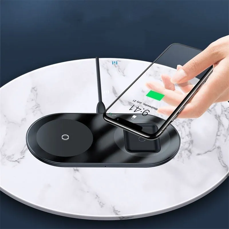 Two-in-one wireless charger, black aluminium and tempered glass, with charging light indicator, on a desk