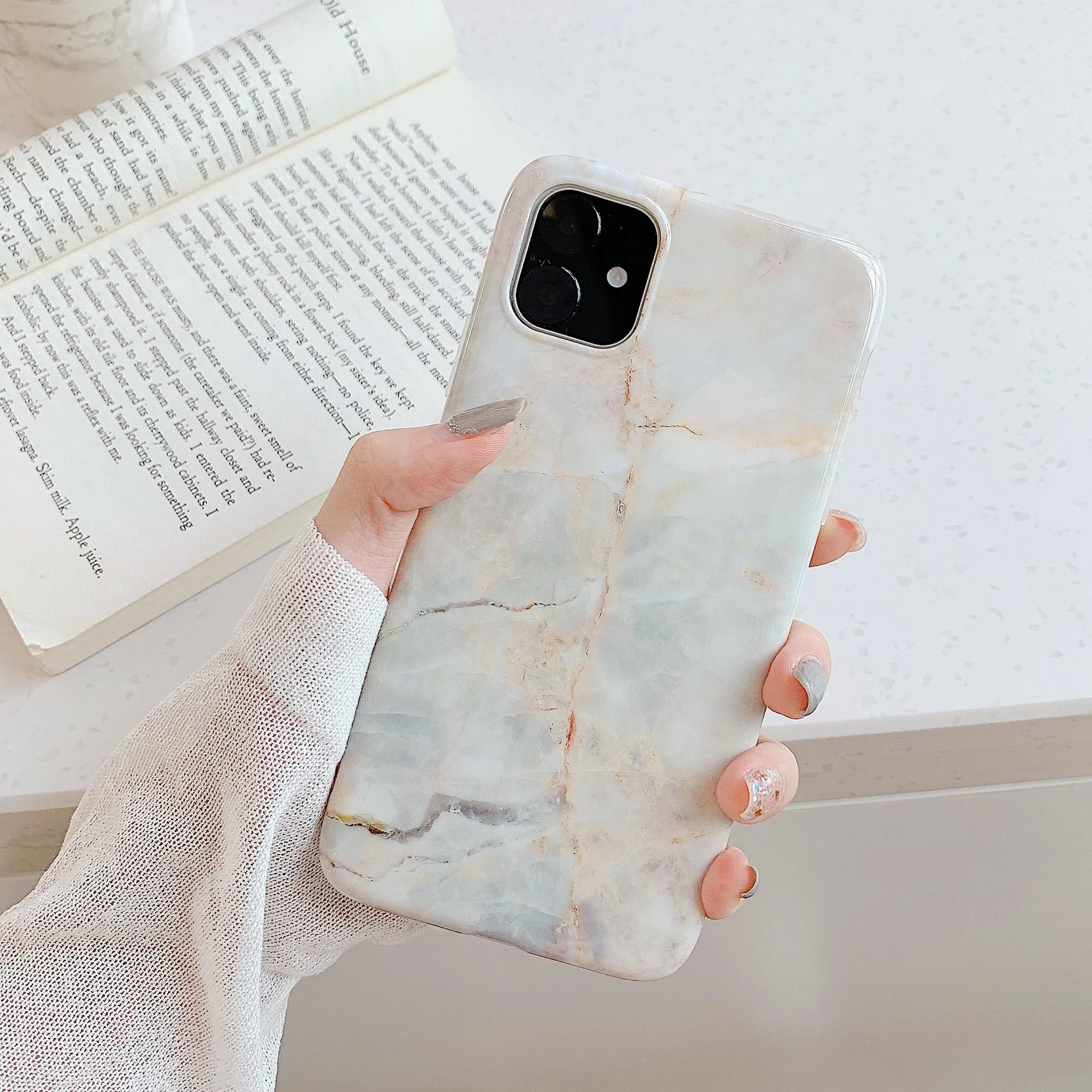 Frosty marble silicone phone case back cover with geometric pattern for iPhone models, available in multiple colours