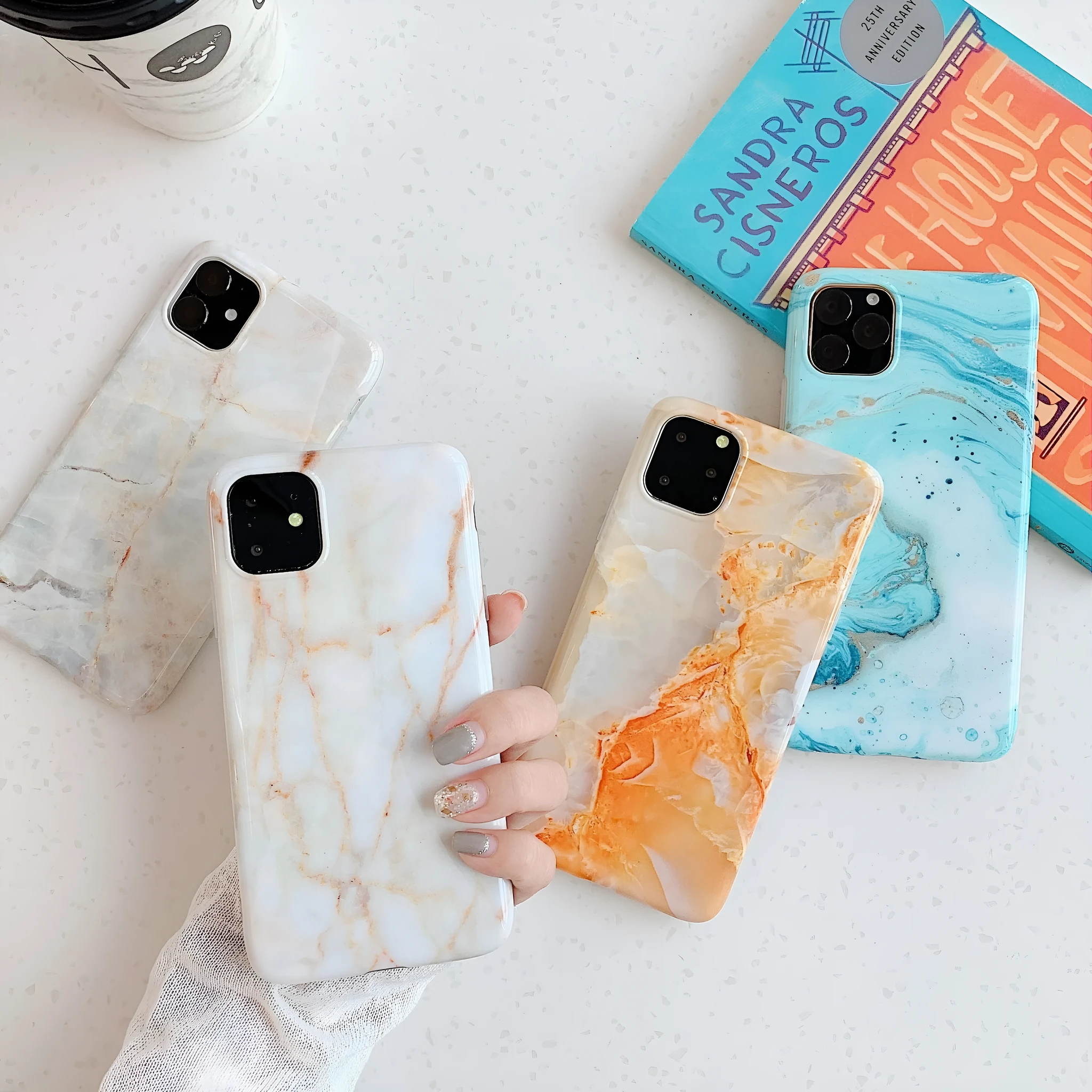 Frosty marble silicone phone case back cover with geometric pattern for iPhone models, available in multiple colours