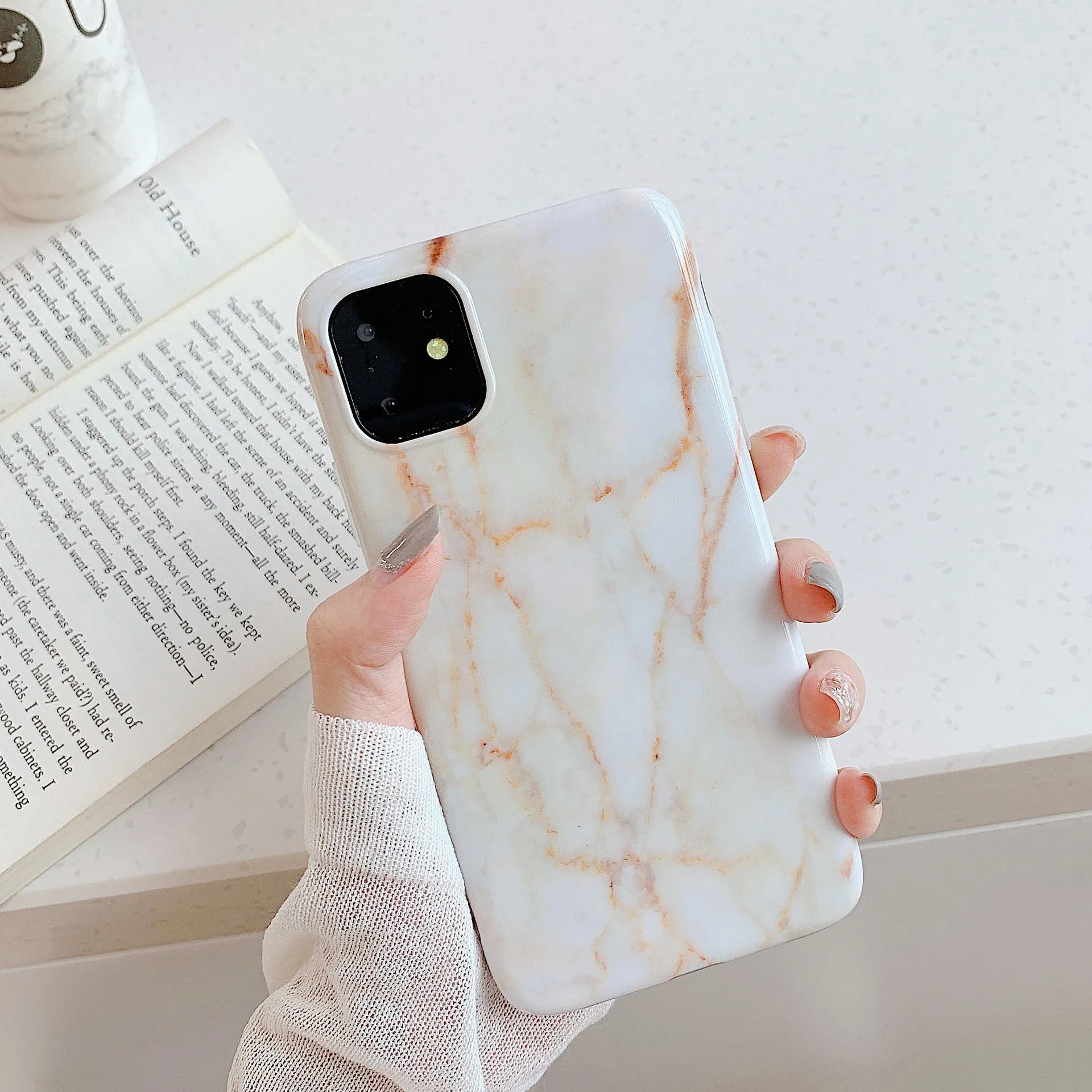 Frosty marble silicone phone case back cover with geometric pattern for iPhone models, available in multiple colours