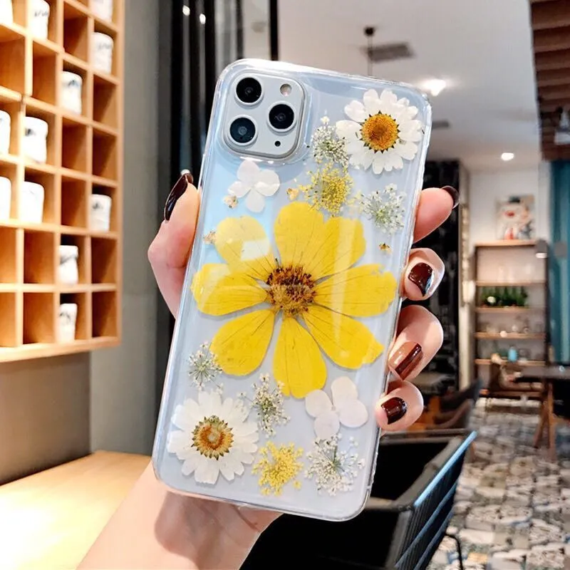 Floral iPhone case with large pink flower pattern on TPU back cover showing camera cutouts