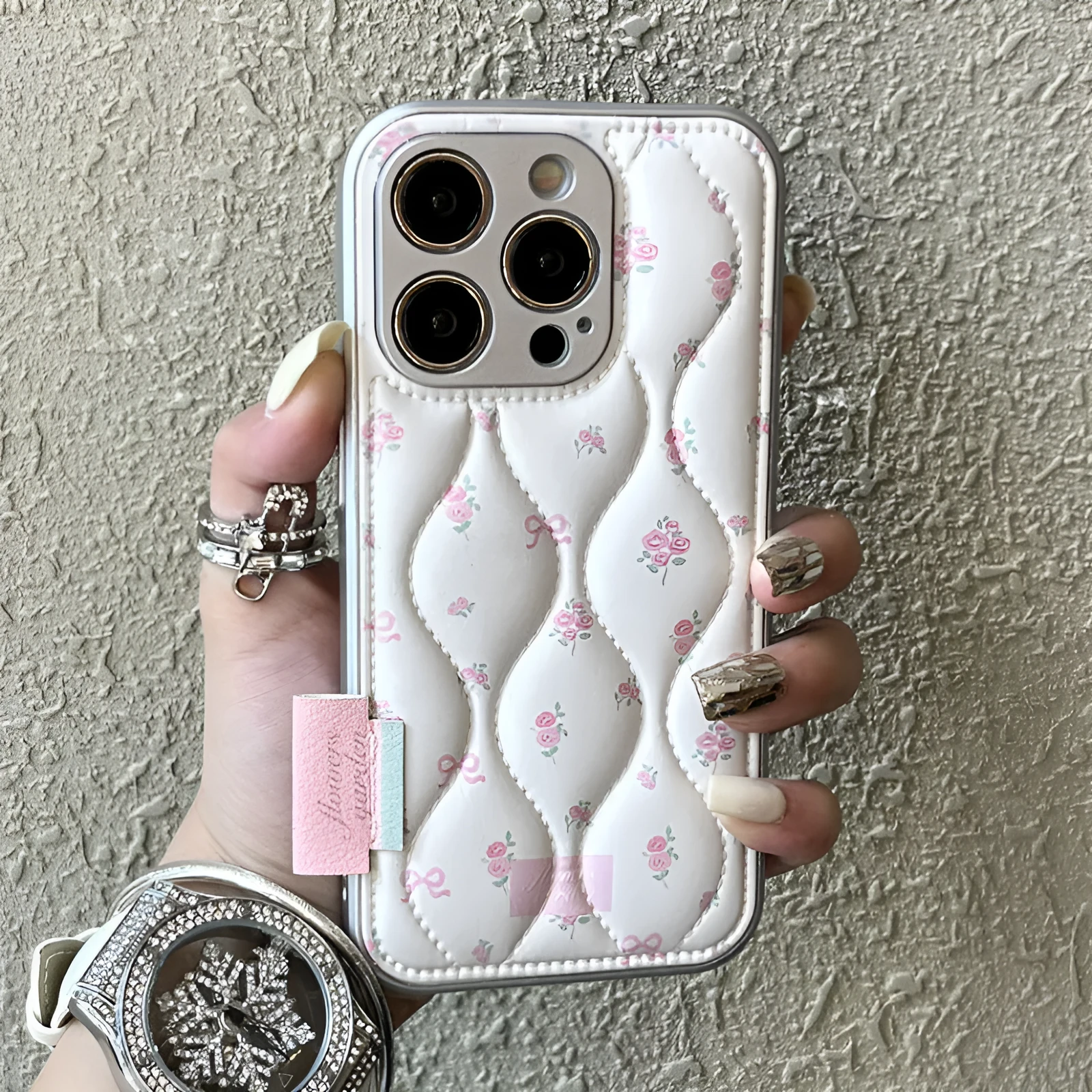 Creative down jacket small floral embossed leather phone case for iPhone