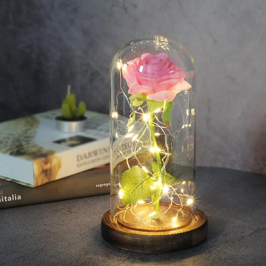Artificial silk rose LED ornament with glass lampshade showing warm white lights, available in multiple colours.