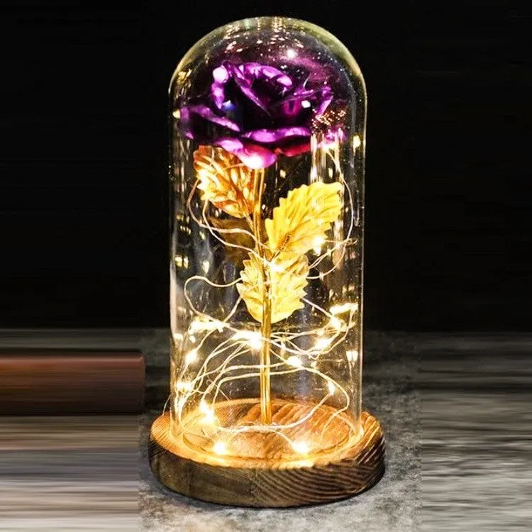 Artificial silk rose LED ornament with glass lampshade showing warm white lights, available in multiple colours.