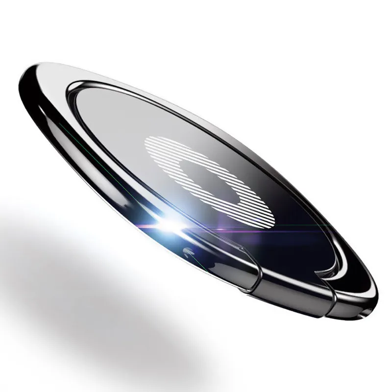 Magnetic ring holder with 360 degree rotating phone buckle in silver on a desk