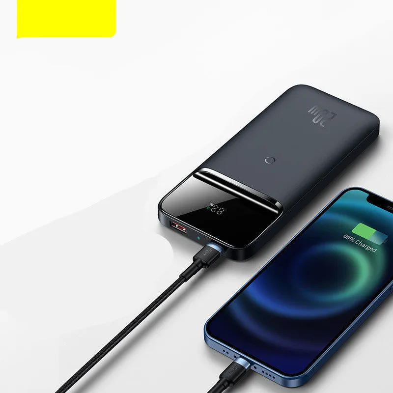 Black magnetic wireless power bank clipped onto an iPhone 12 showing 10000mAh capacity and two-way fast charging support