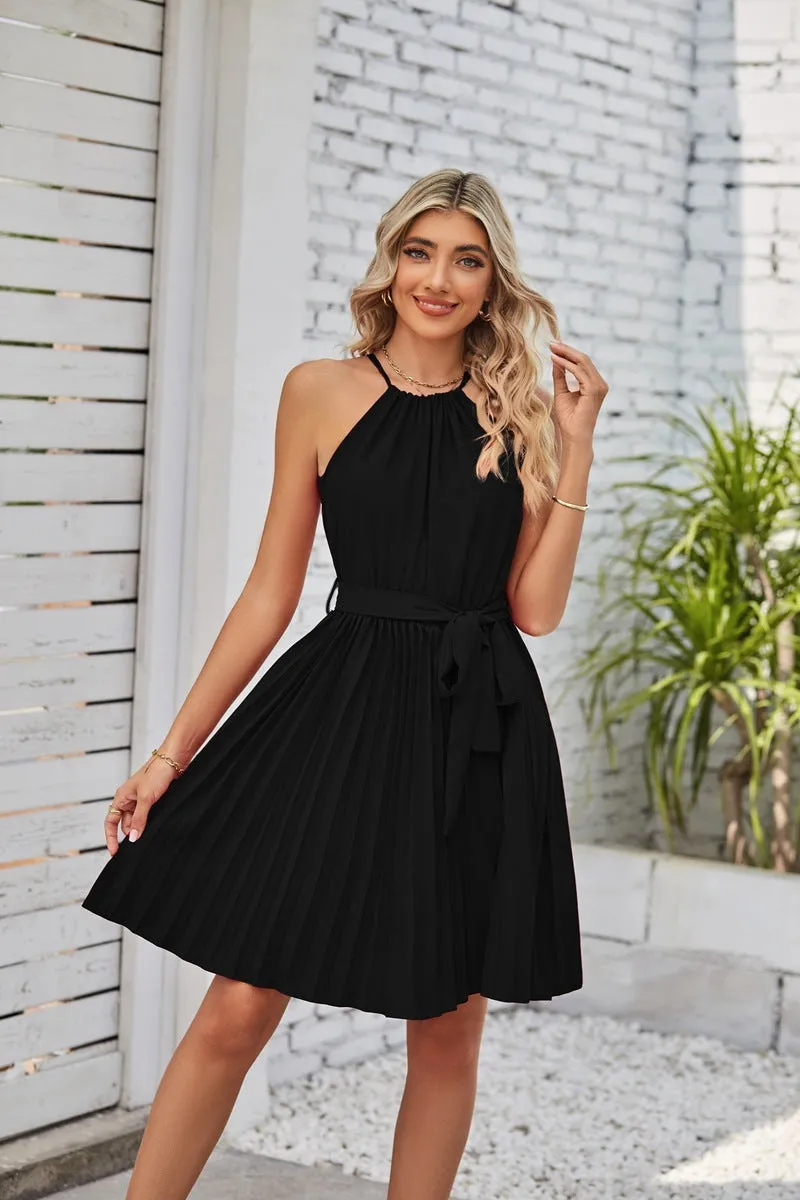 Women's black halter neck strapless sundress with a pleated chiffon skirt and an adjustable waist belt.