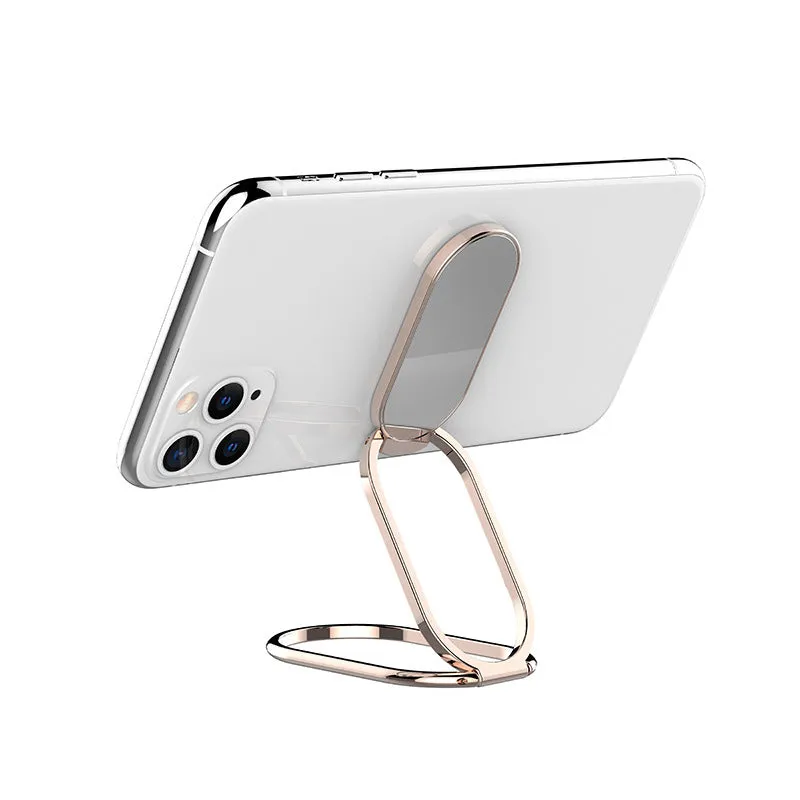 Ring buckle metal magnetic folding lazy phone holder on a desktop in black.