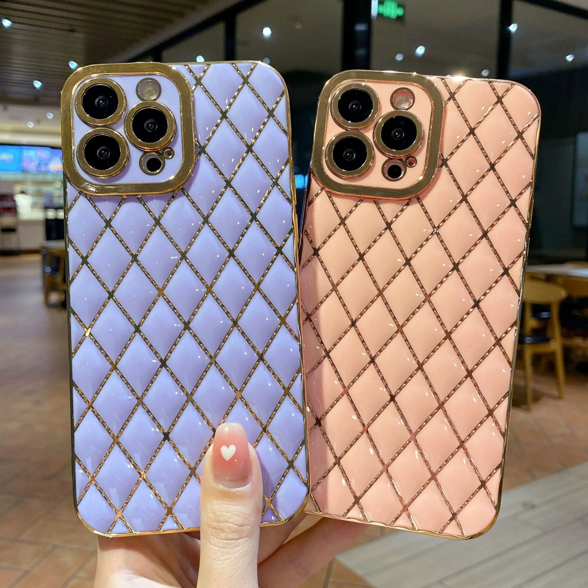Electroplated 6D diamond TPU iPhone back cover in black, angled view with reflective pattern