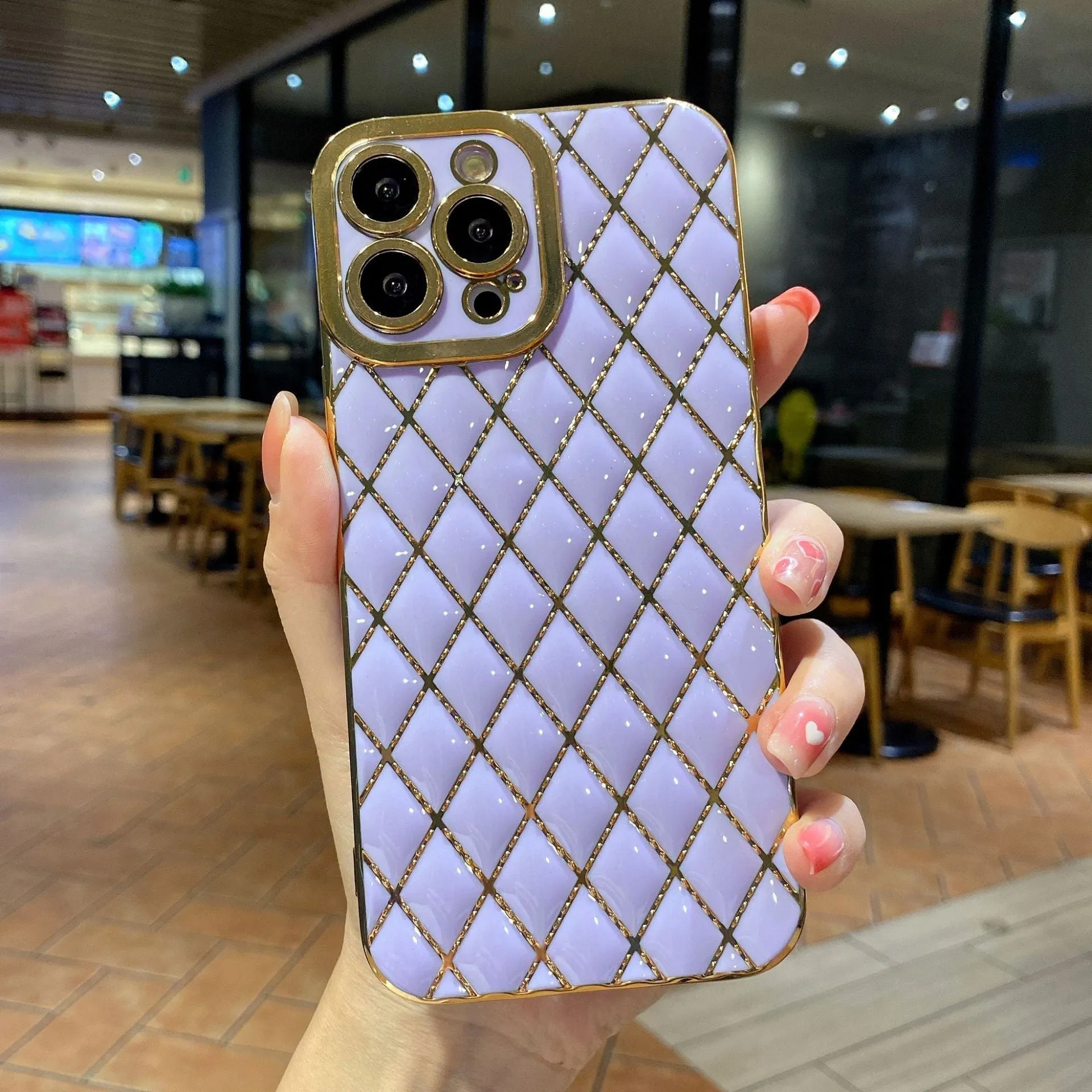 Electroplated 6D diamond TPU iPhone back cover in black, angled view with reflective pattern