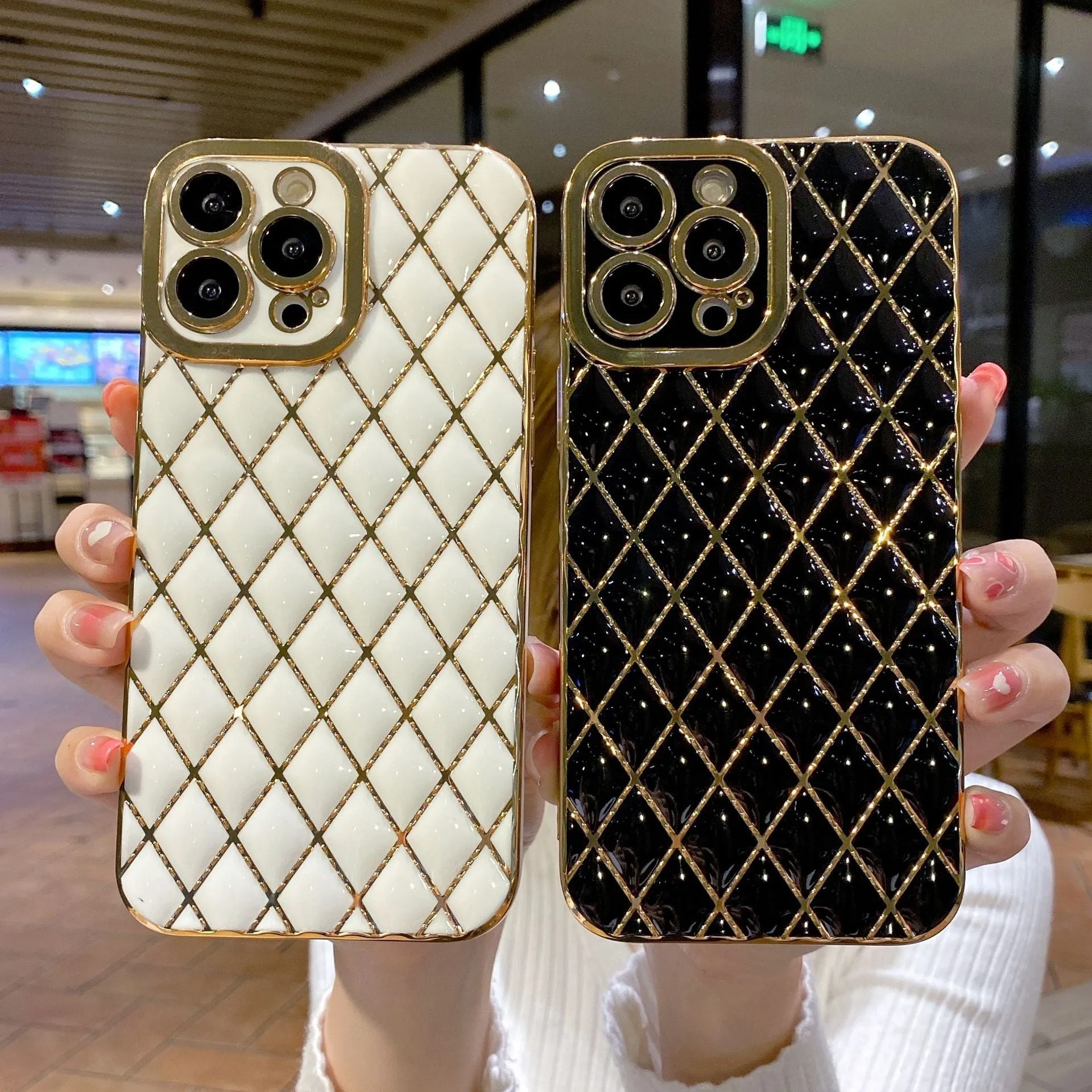 Electroplated 6D diamond TPU iPhone back cover in black, angled view with reflective pattern