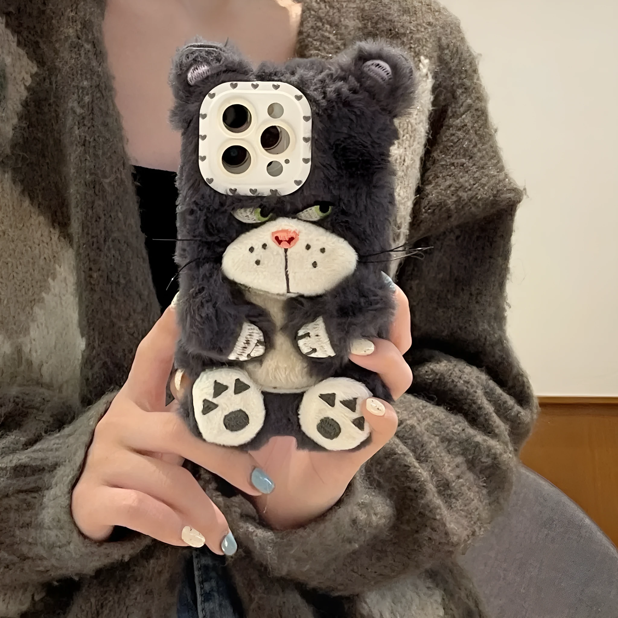 Plush staring cat phone case for iPhone with soft furry texture and love lens design