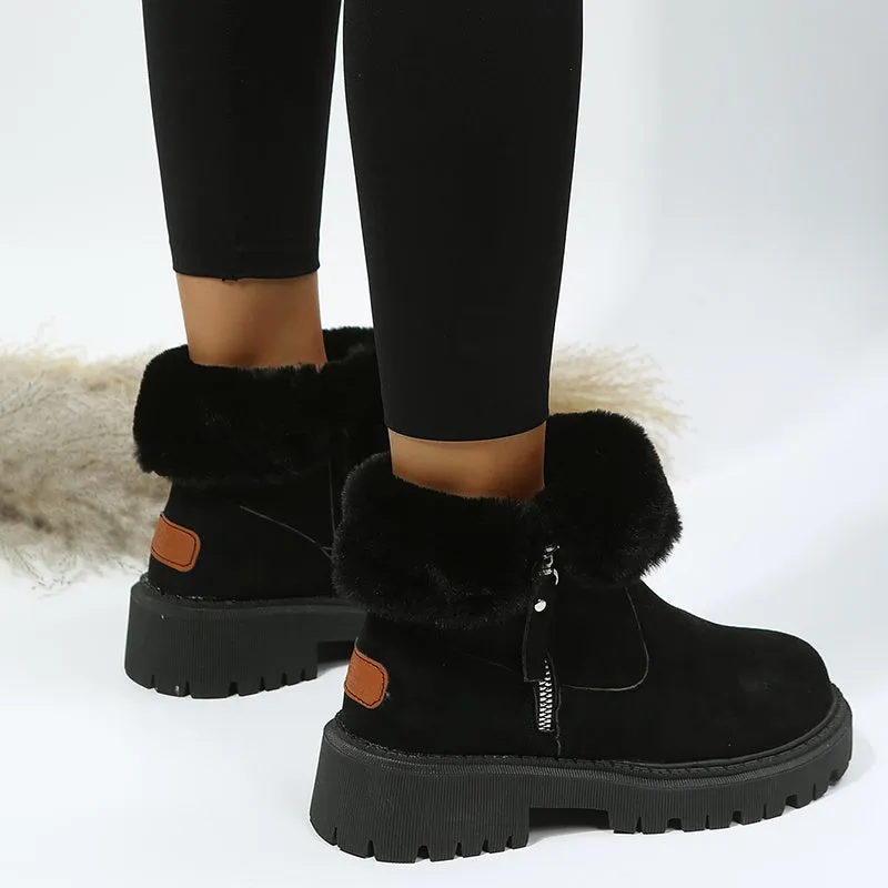 Women's black faux suede high-top snow boots with side zip and thick faux fur lining visible at the ankle.