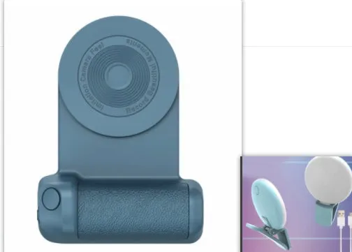 Black magnetic phone camera grip with rotatable stand and ergonomic PU leather handle on a table.