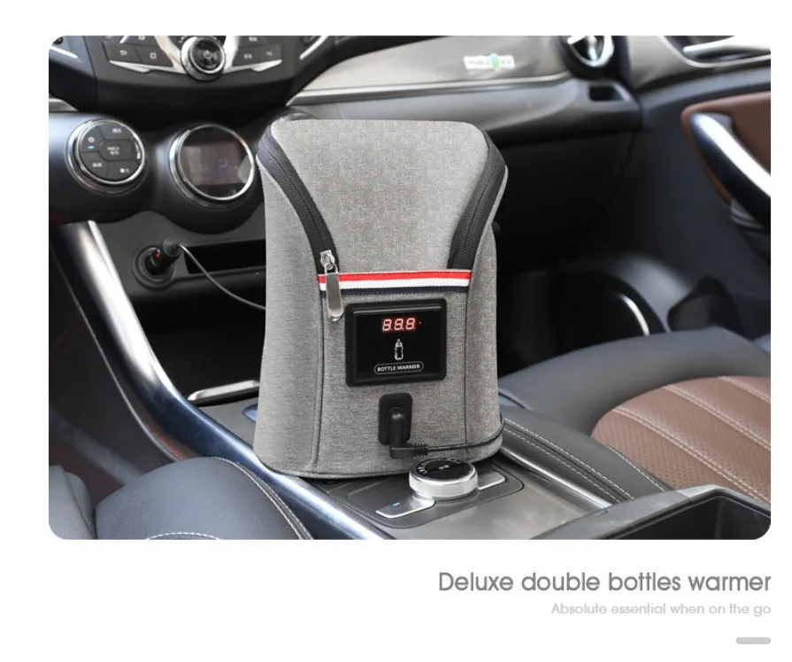 Grey Oxford cloth portable car USB baby bottle warmer with display, shown with two bottles and a 12V car charger.