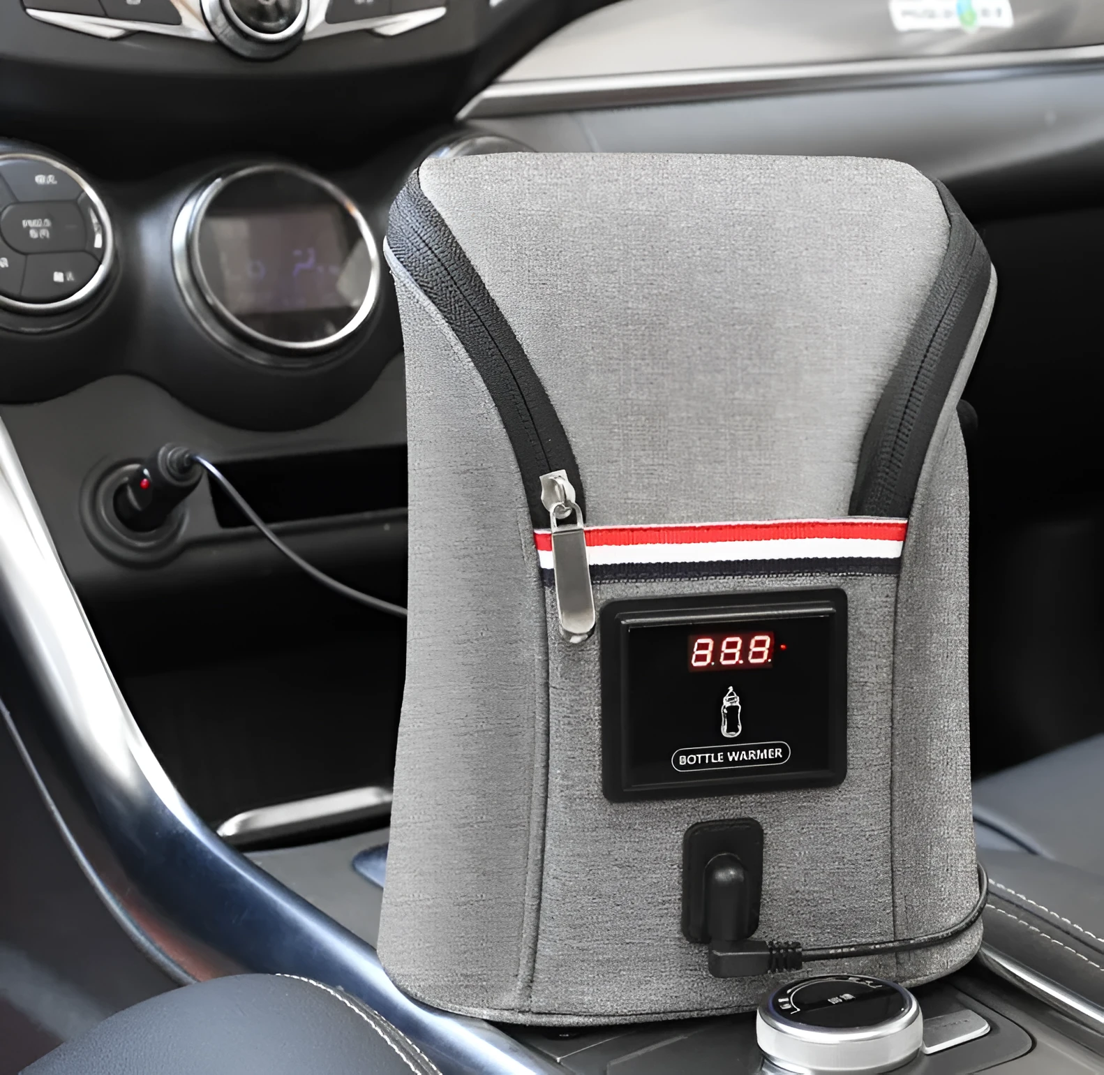 Grey Oxford cloth portable car USB baby bottle warmer with display, shown with two bottles and a 12V car charger.