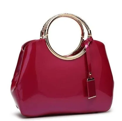 Plain polyester women's party handbag in black with card slot and zipper pocket.