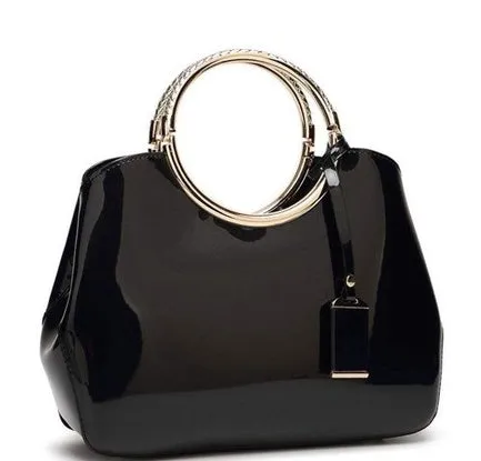 Plain polyester women's party handbag in black with card slot and zipper pocket.