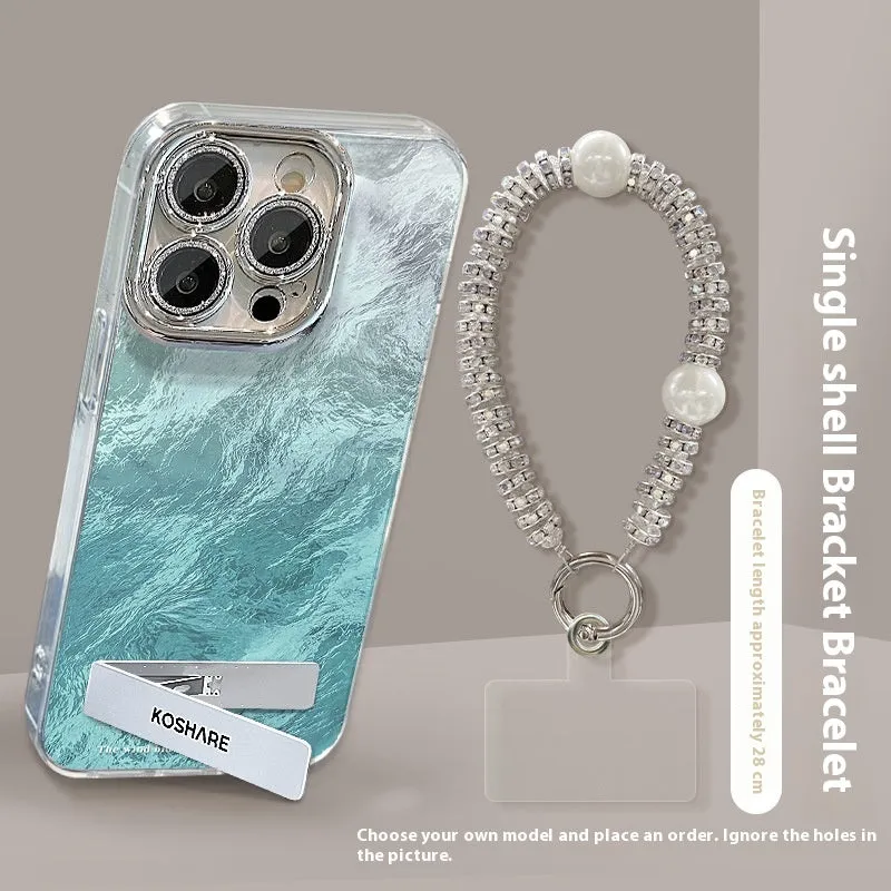 Ice blue gradient hard PC phone case with invisible bracket and silver chain for iPhone set on a white surface