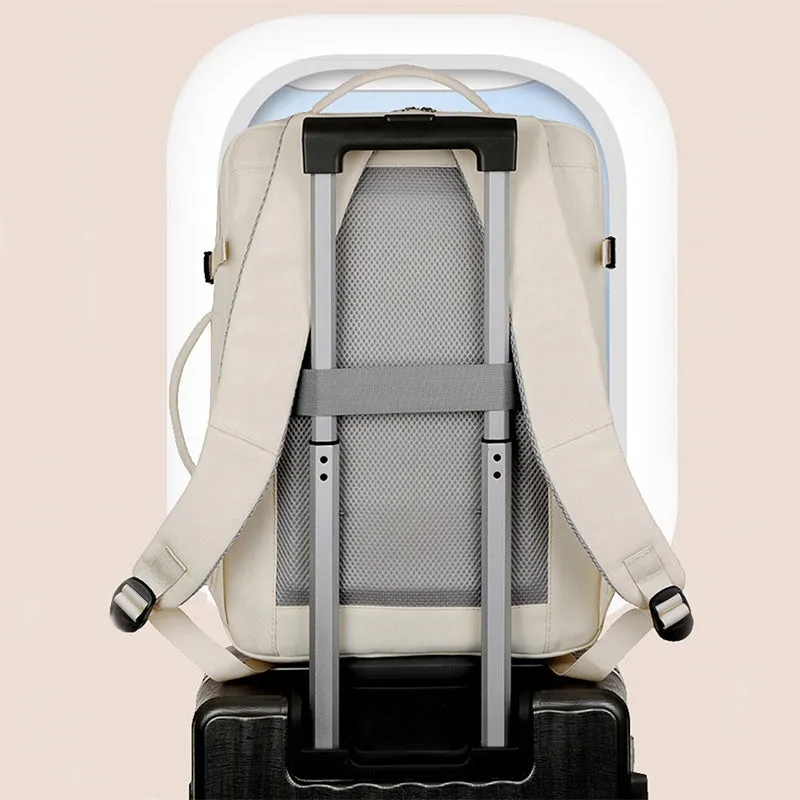 Large waterproof Oxford cloth backpack in a choice of colours, shown with multiple zippered pockets and a 15.6-inch laptop.