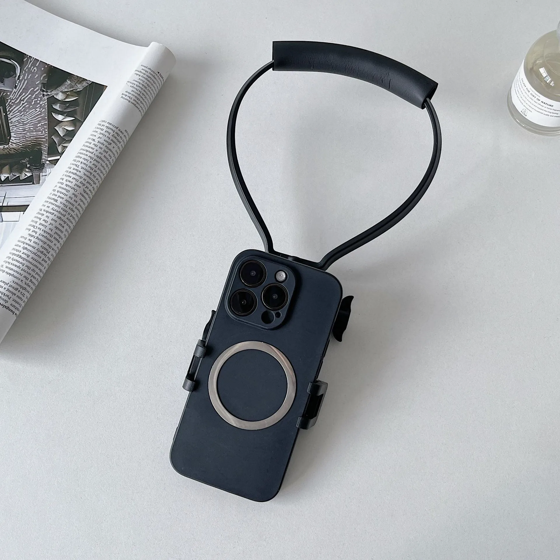 Black plastic cell phone neck hanging bracket with anti slip cushion and extension for horizontal vertical shooting