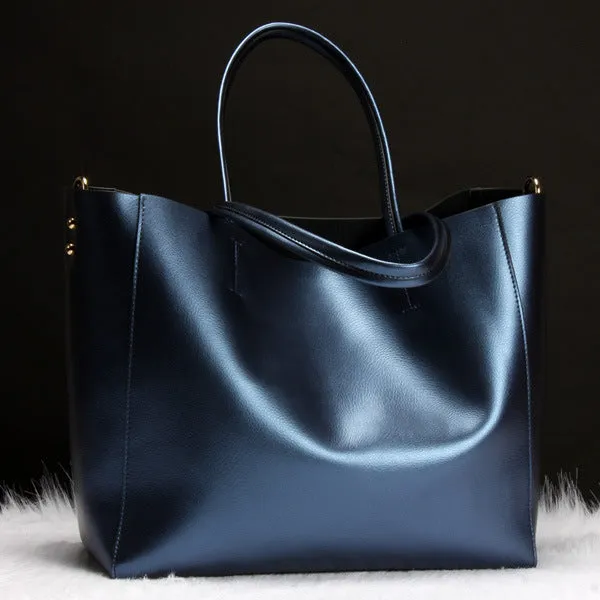 Cowhide leather women's shoulder bag with adjustable strap in black blue bronze silver or wine red colour