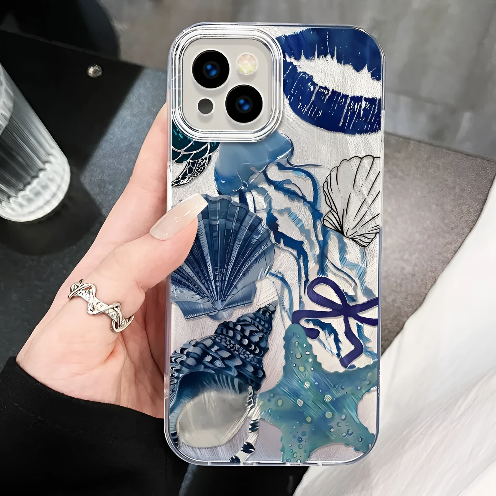 Coral shell large hole feather yarn TPU phone case for Apple iPhone in blue Star River yinshanhu colour