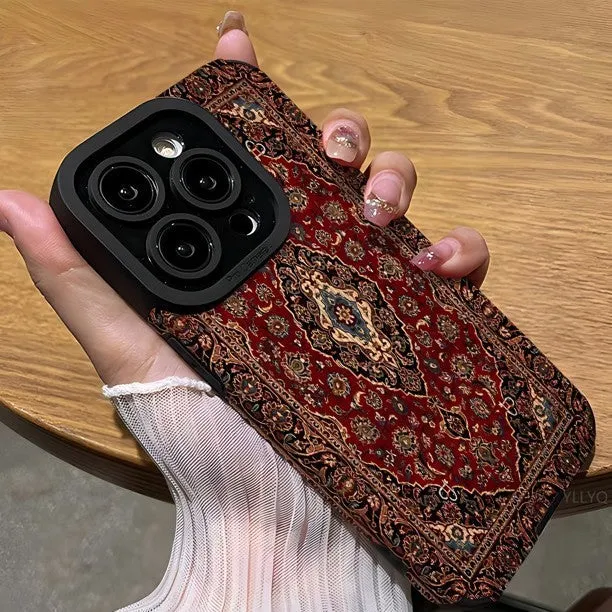 Yellow imitation leather phone case with embossed Persian carpet pattern and attached lanyard, viewed from the back
