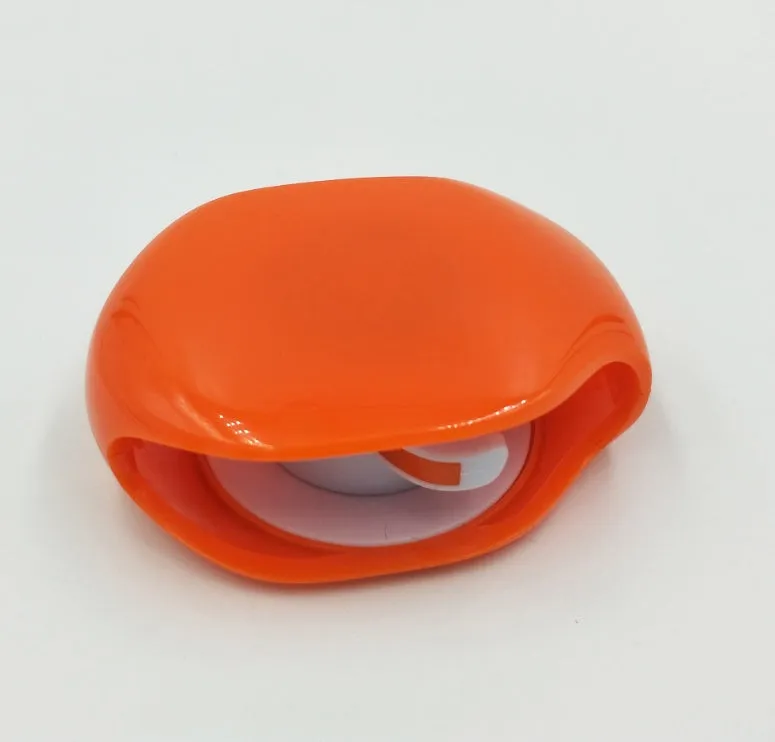 Automatic cable winder retractor in PC ABS plastic showing compact size and colour options.