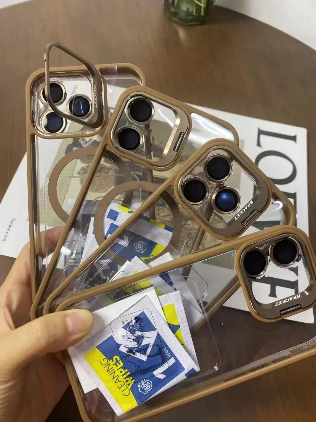 Acrylic transparent phone case with magnetic lens bracket in navy blue for iPhone 17 series
