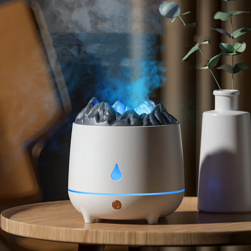 Volcano design humidifier with flaming mountain shape showing fog output from single outlet