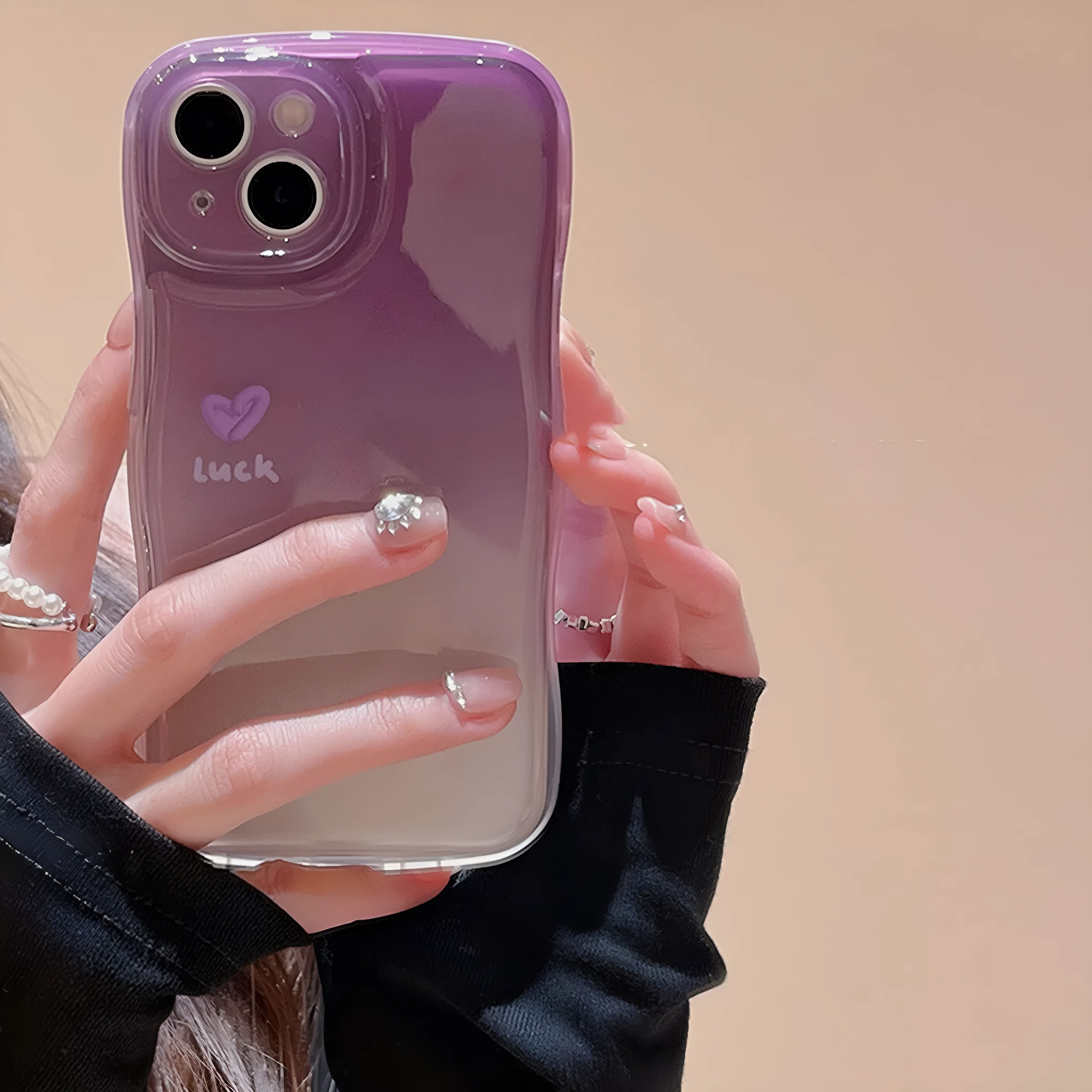 Purple tinged TPU mobile phone case with fall prevention, compatible with iPhone models, with optional chain
