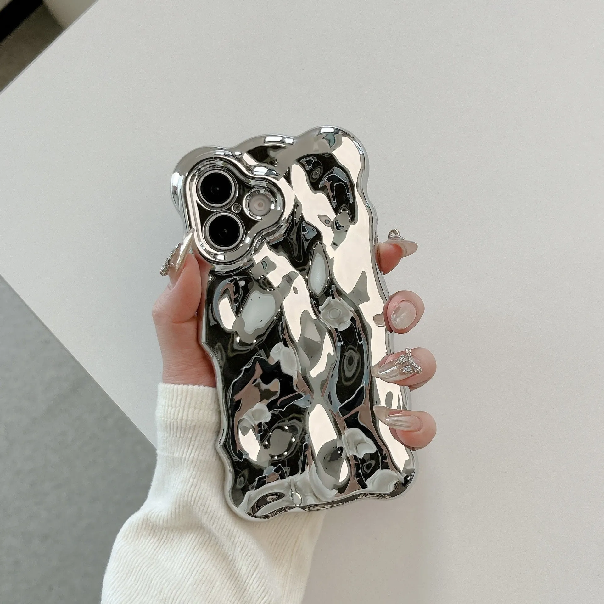 Niche Advanced Sense Plating Shell TPU phone case with wave bubble finish in silver electroplated colour