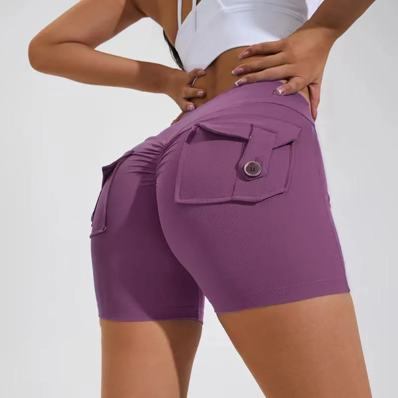 Women's high waist hip lifting shorts in avocado green with side pockets during yoga pose