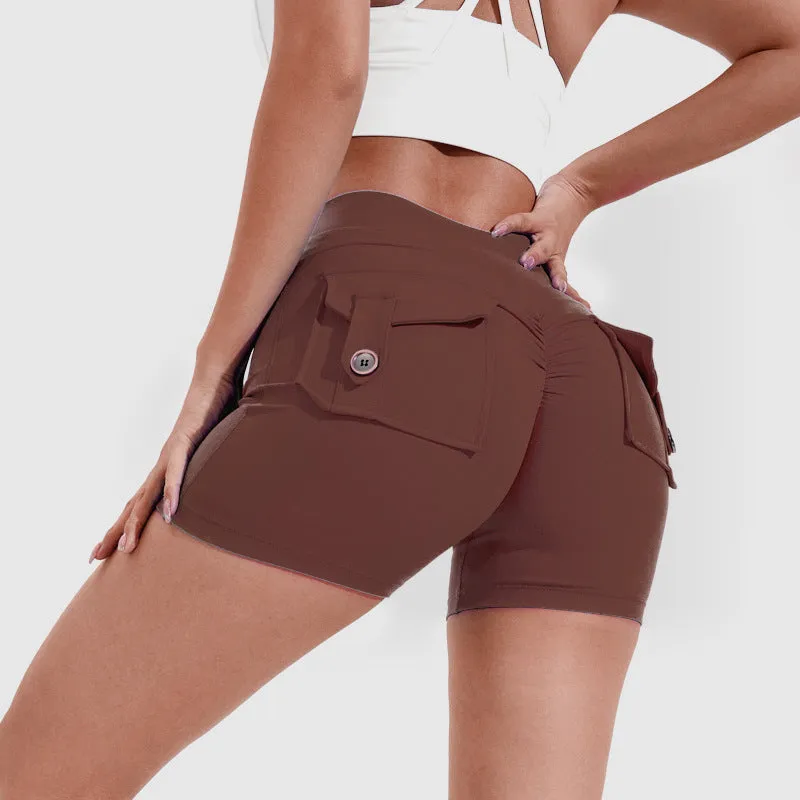 Women's high waist hip lifting shorts in avocado green with side pockets during yoga pose