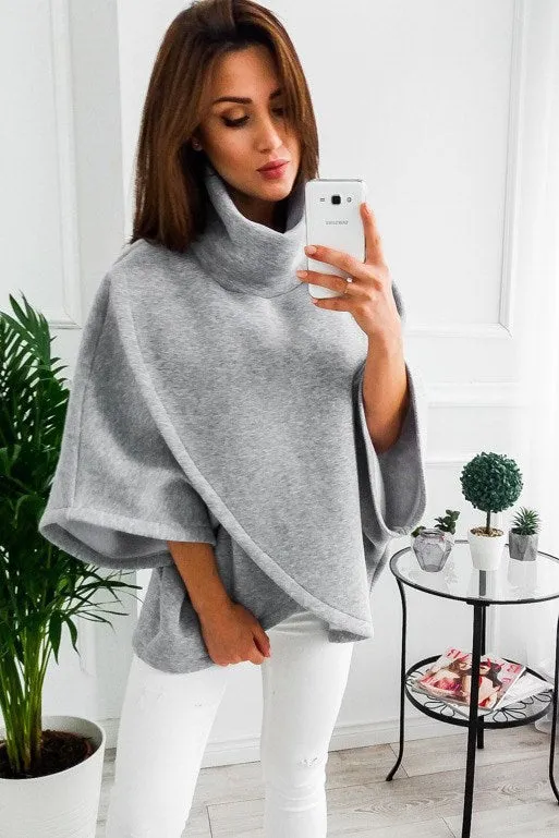 Women's long black batwing sleeve cardigan with plush velvet fabric and three-button placket