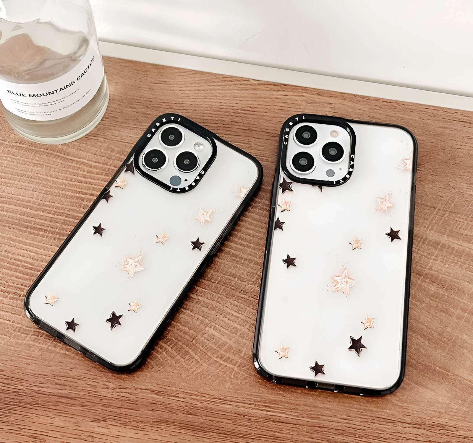 Hard PC phone case with engraved lucky star doodle design and acrylic side finish