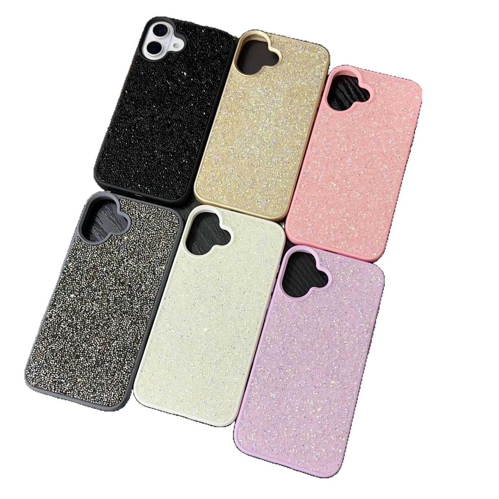 Skin Feeling Carbink phone case for iPhone 14 Pro with large hole cutouts and handmade rhinestone decorations in white, black, and pink colours