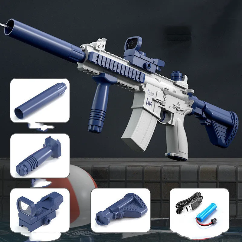 Blue electric water gun toy with USB charging cable on a sandy beach