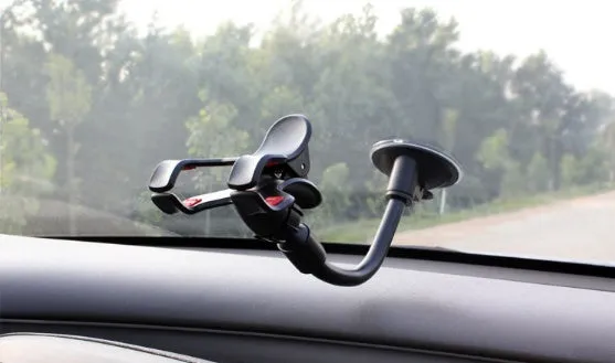 Guitar phone holder stand with suction cups attached to a guitar showing lyrics on phone screen