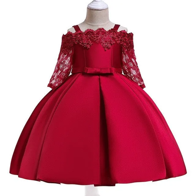 Simple lace-trimmed children's dress in deep red, available in toddler and child sizes.
